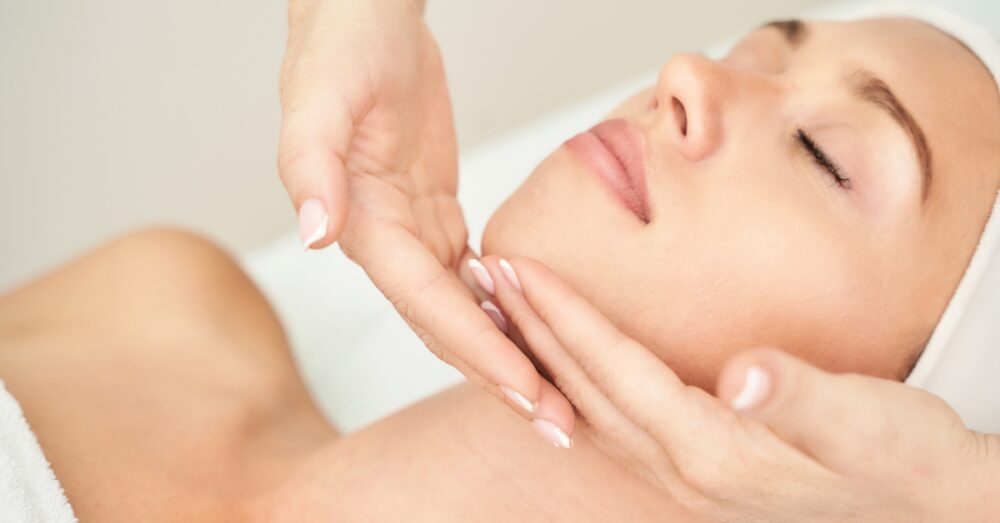 Woman receiving a facial treatment at a medical spa